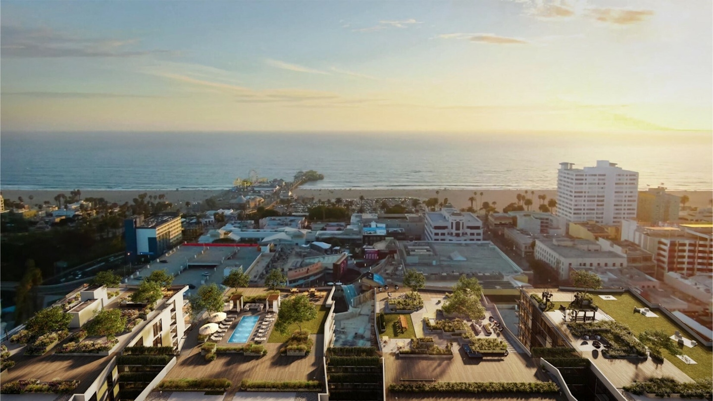 Aerial view of the The Park, a luxury apartment complex featuring a 1-acre rooftop park offering views of the Pacific Ocean in Santa Monica | The Park